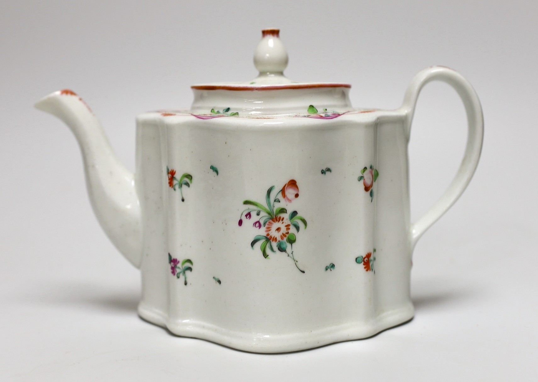 A late 18th century painted Newhall teapot and cover. 14.5cm high
